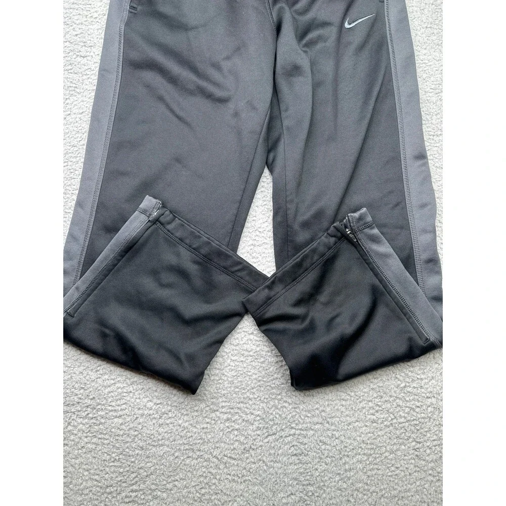 Nike Thermafit athletic pants size medium light gray dark gray